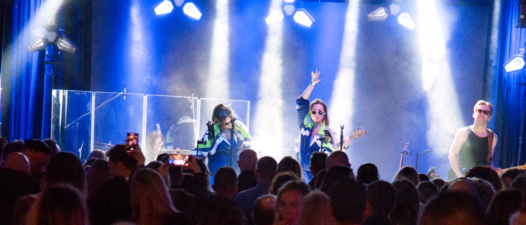 A packed crowd at a live concert in Food Town
